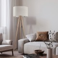 lampa stojąca na trzech nogach